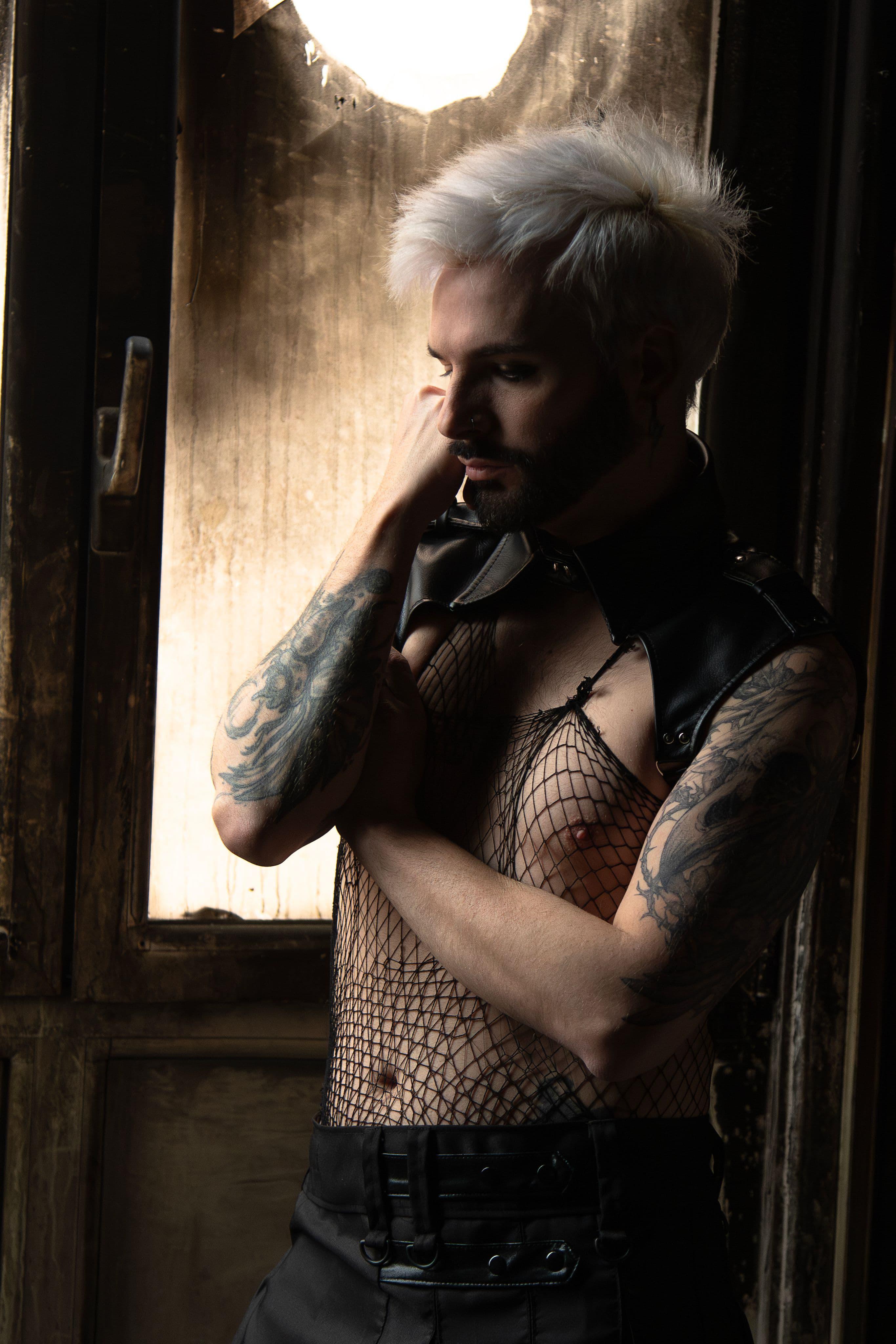 Arka Devbil, vocals, lyrics and art direction in Darkold